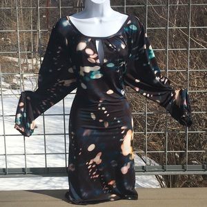 Anna Scholz shift dress with bell sleeves.